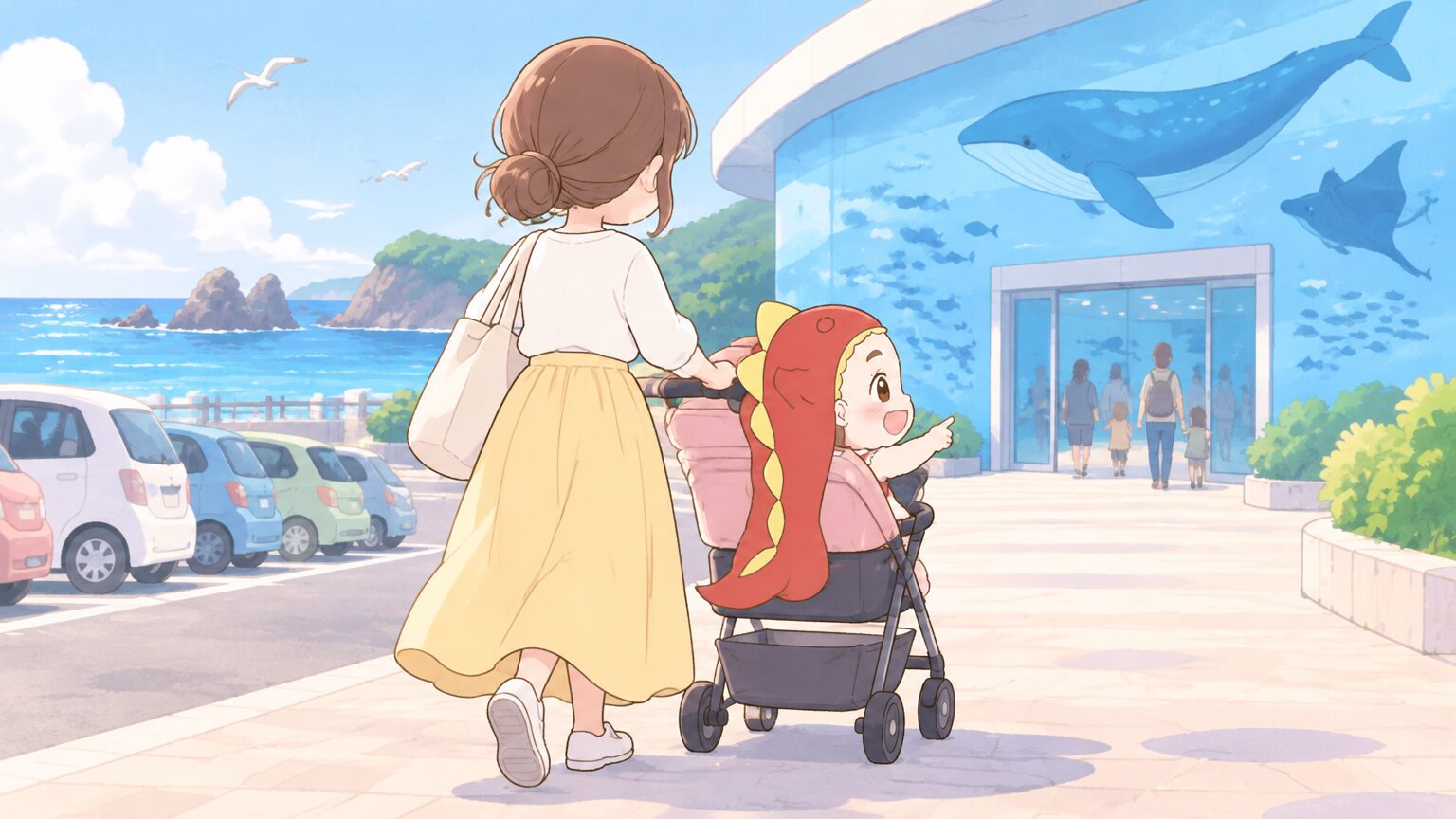 日本海を望む駐車場で、ベビーカーに子どもを乗せて水族館の入口へ向かう親子の後ろ姿